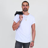 Man wearing a white shirt against a plain background