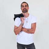 Man wearing a white shirt against a white background